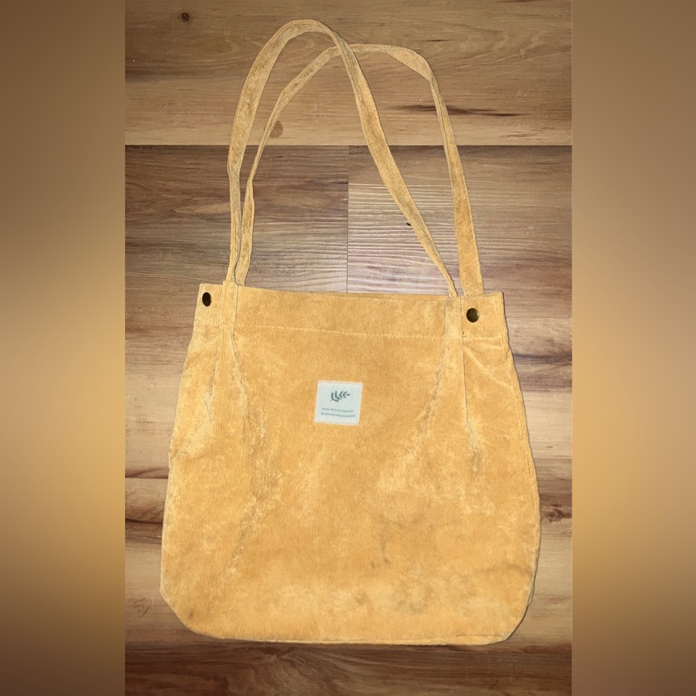 light yellowish orange corduroy tote bag, slightly used and in good condition